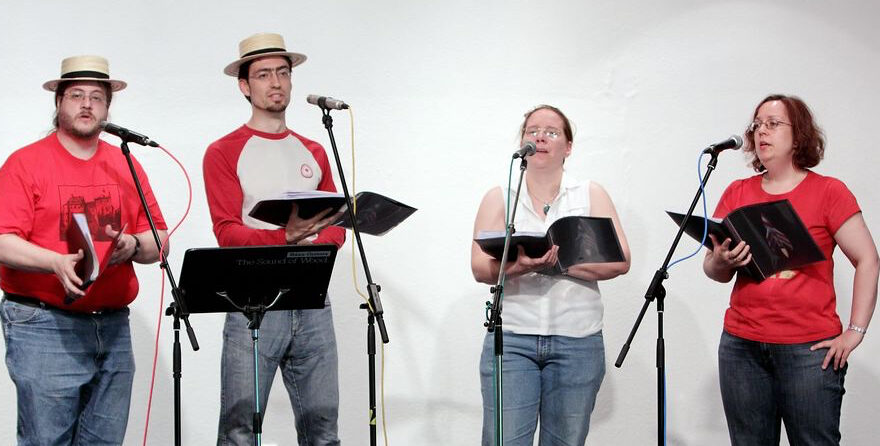 Barbership at DFDF in 2009, our first concert - we are wearing white and red shirts and the guys sport straw hats.