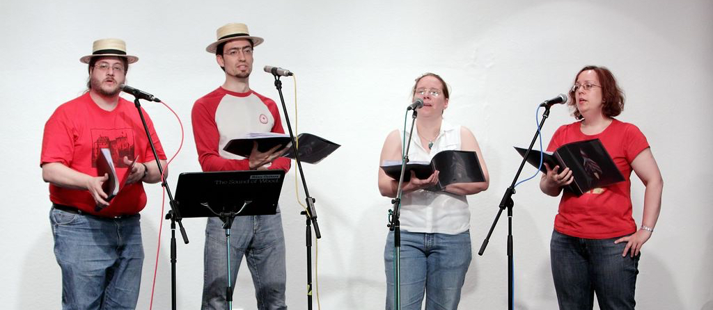 Barbership at DFDF in 2009, our first concert - we are wearing white and red shirts and the guys sport straw hats.